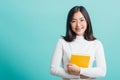 Portrait female in glasses is holding the books on hand Royalty Free Stock Photo