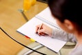 Portrait of a female hand writing notes Royalty Free Stock Photo