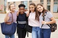 Portrait Of Female High School Student Friends Standing Outside School Buildings Royalty Free Stock Photo