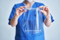 Portrait of female medical doctor wearing protective mask and face shield