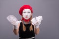 Portrait of female mime angry crumpling a paper Royalty Free Stock Photo
