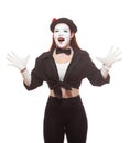 Portrait of a female mime artist performing, isolated on white background. Symbol of joy, surprise, pleasant meeting Royalty Free Stock Photo