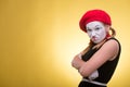 Portrait of female mime isolated on yellow Royalty Free Stock Photo