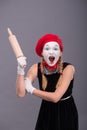 Portrait of female mime with red hat and white Royalty Free Stock Photo