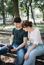 Portrait of female model and male photographer checking photos on camera Royalty Free Stock Photo