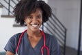 Portrait Of Female Nurse Wearing Scrubs In Hospital Royalty Free Stock Photo