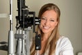 Portrait of Female Optician in Examination Room