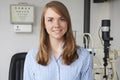 Portrait Of Female Optician In Optometrists