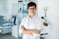 Portrait of female optometrist at eyesight medical clinic