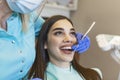 Portrait of female patient having treatment at dentist.Dentist examining a patient`s teeth in dentist office Royalty Free Stock Photo