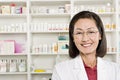 Portrait Of Female Pharmacist Smiling Royalty Free Stock Photo