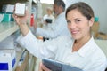 Portrait female pharmacists working in modern farmacy