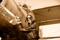 Portrait of female pilot with plane propeller