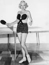 Portrait of female ping pong player in costume Royalty Free Stock Photo