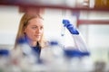 Portrait of a female researcher doing research in a lab