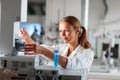 Portrait of a female researcher doing research in a lab