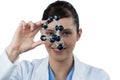 Portrait of female scientist holding molecular model Royalty Free Stock Photo