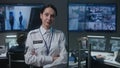 Portrait of female security officer in police monitoring center