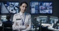 Portrait of female security worker looking at camera