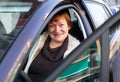 Portrait of female senior driver in car Royalty Free Stock Photo