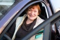 Portrait of female senior driver in car Royalty Free Stock Photo