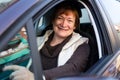 Portrait of female senior driver in car Royalty Free Stock Photo