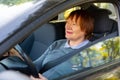 Portrait of female senior driver in car Royalty Free Stock Photo