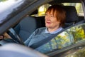 Portrait of female senior driver in car Royalty Free Stock Photo