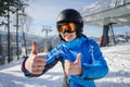 Portrait of female skier on the top of ski slope Royalty Free Stock Photo