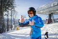 Portrait of female skier on the top of ski slope Royalty Free Stock Photo