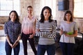 Portrait Of Female Staff Standing In Modern Design Office Royalty Free Stock Photo