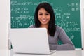 Portrait of female student using laptop Royalty Free Stock Photo