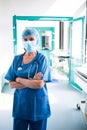 Portrait of female surgeon standing in corridor Royalty Free Stock Photo