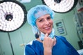 Portrait of female surgeon standing in operation room Royalty Free Stock Photo