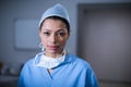 Portrait of female surgeon standing in operation room Royalty Free Stock Photo