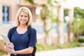 Portrait Of Female University Student Outdoors On Campus Royalty Free Stock Photo