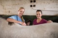 Portrait of female vet with woman standing by horse Royalty Free Stock Photo