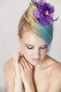 Portrait of feminine woman with blonde and blue ombre hair and purple makeup Royalty Free Stock Photo