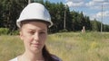 portrait of a feminized woman in a helmet.