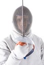 Portrait of fencer in uniform holding rapier in hand Royalty Free Stock Photo