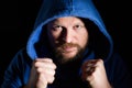 Portrait of a fighter in a hood Royalty Free Stock Photo