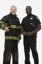 Portrait of a firefighter and a police officer Royalty Free Stock Photo