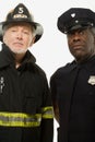 Portrait of a firefighter and a police officer Royalty Free Stock Photo