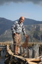 An old fisherman at fishing town in Dalyan, Turkey Royalty Free Stock Photo