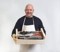 portrait of a fishmonger on white background Royalty Free Stock Photo