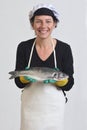 Portrait of a fishmonger showing Royalty Free Stock Photo