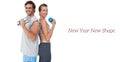 Portrait of a fit couple exercising with dumbbell Royalty Free Stock Photo