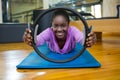 Portrait of fit woman exercising with pilates ring in fitness studio Royalty Free Stock Photo