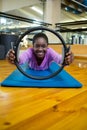 Portrait of fit woman exercising with pilates ring in fitness studio Royalty Free Stock Photo