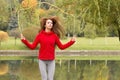 Portrait of fit young woman with jump rope in a park. Fitness female doing skipping workout outdoors Royalty Free Stock Photo